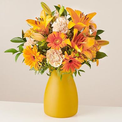 Radiant Sunrise: Lilies and Carnations