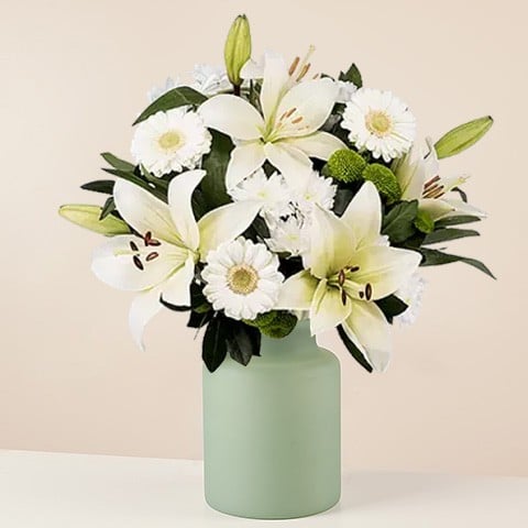 Genuine Emotion: Lilies and Gerberas