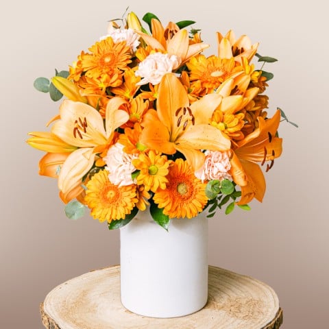 Radiant Sunrise: Lilies and Carnations