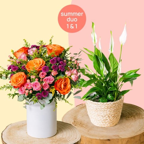 Doppelt so viele Lächeln: Orange Rosen und Friedenslilie