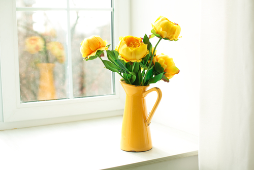 Yellow flowers and vase