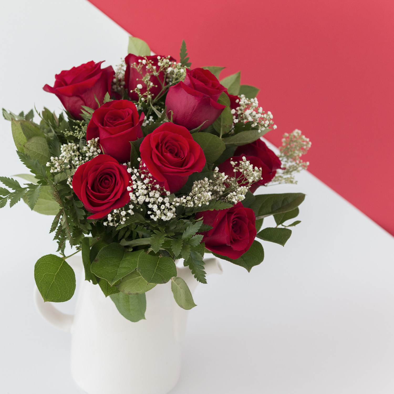 Red roses and red and white background