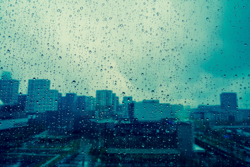 Sad rainy day, gloomy city