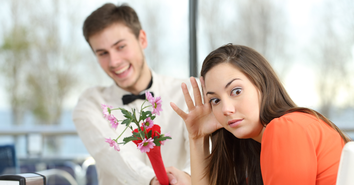 Woman horrified by man's flowers
