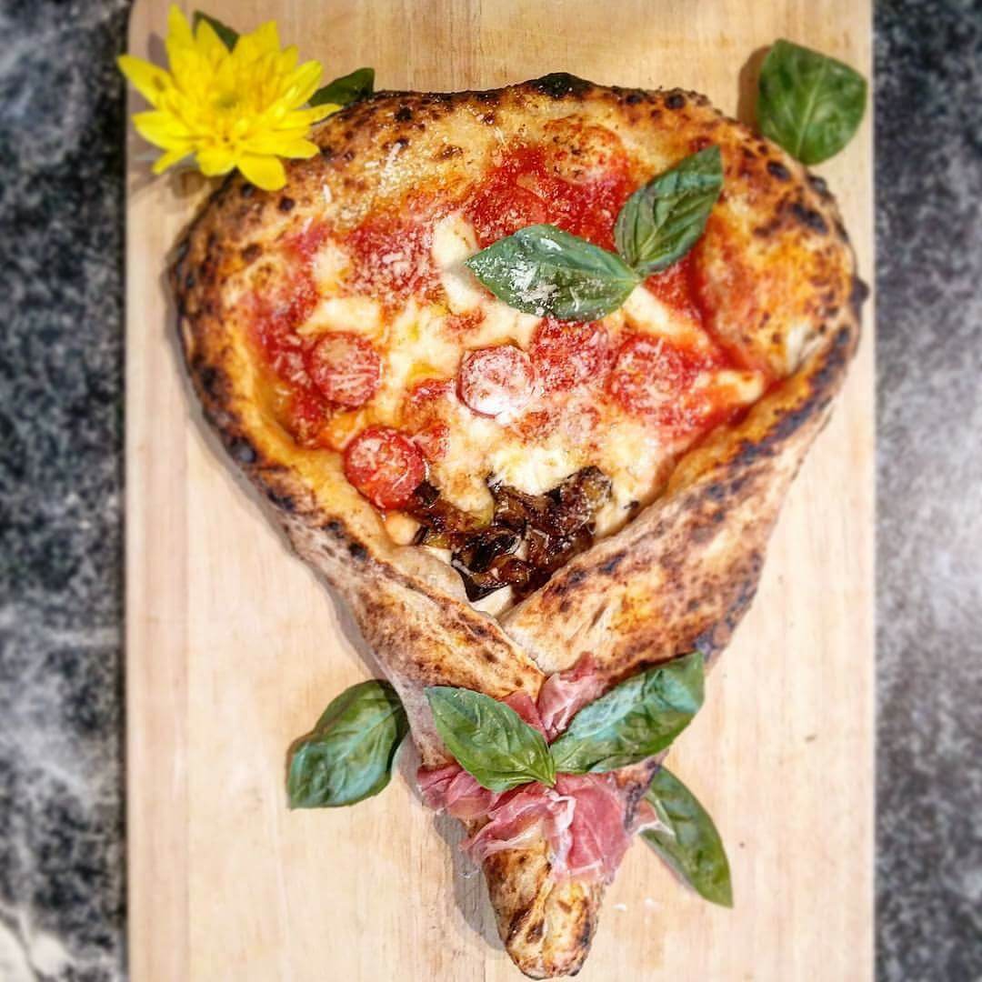 Gigio bouquet pizza on wooden cutting board