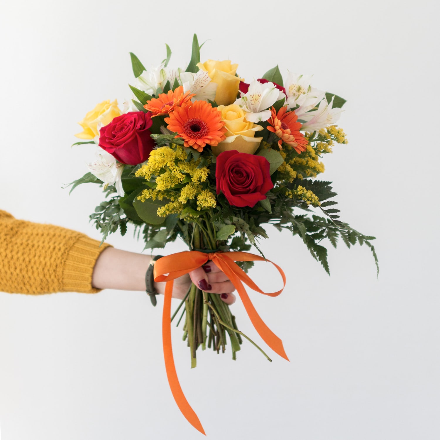 Bouquet orange FloraQueen en main