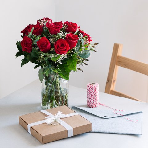 Red roses and package