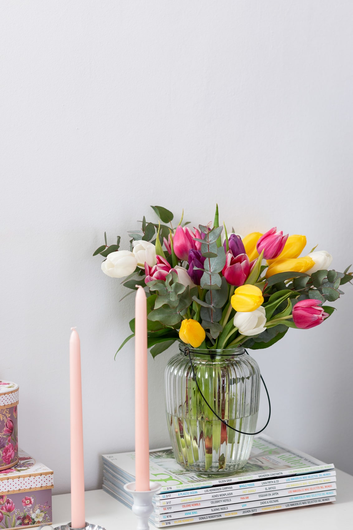 bright tulip bouquet and candles