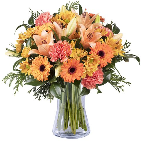 bouquet de lys oeillets et chrisanthèmes orange dans un vase