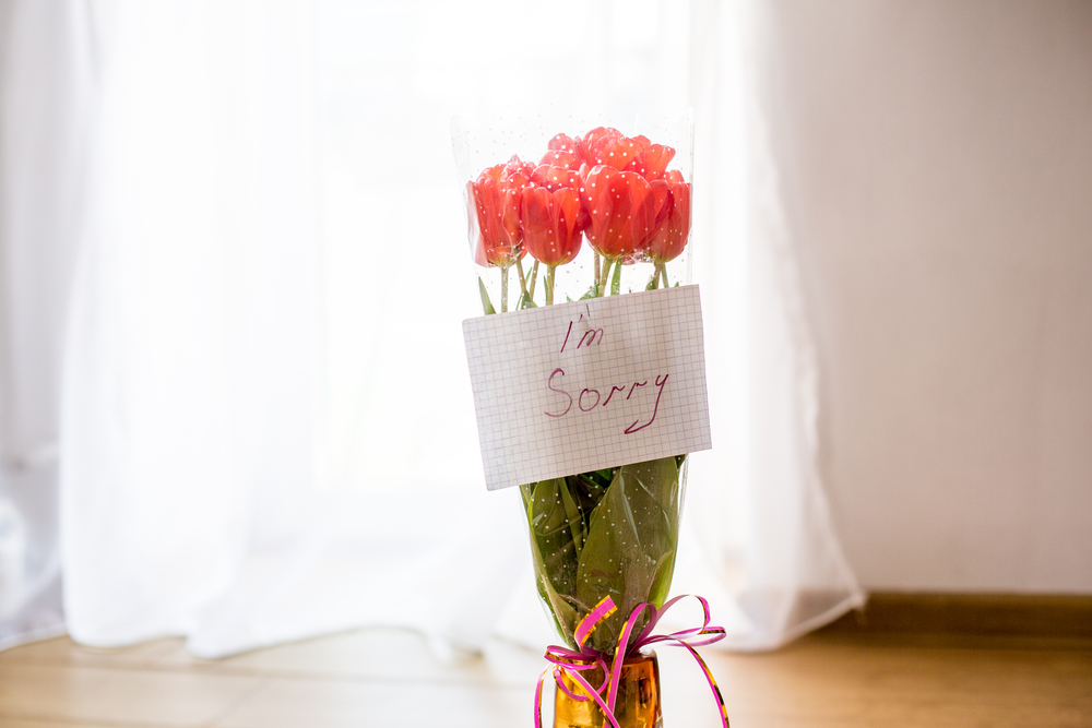 bouquet de fleurs avec mot d'excuses